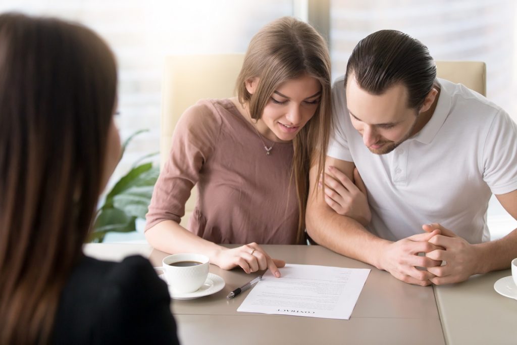 Couple reviewing a loan document
