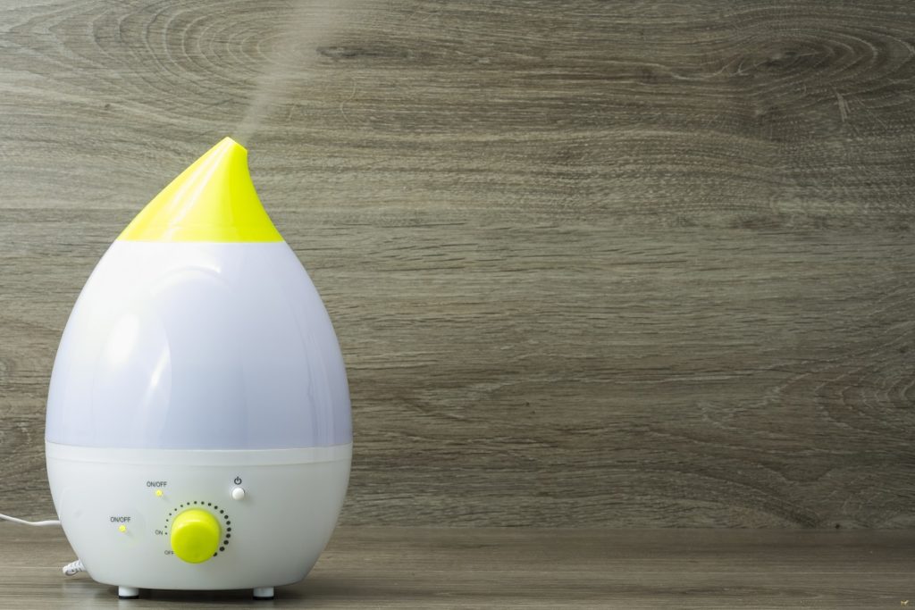 Humidifier on a wooden background