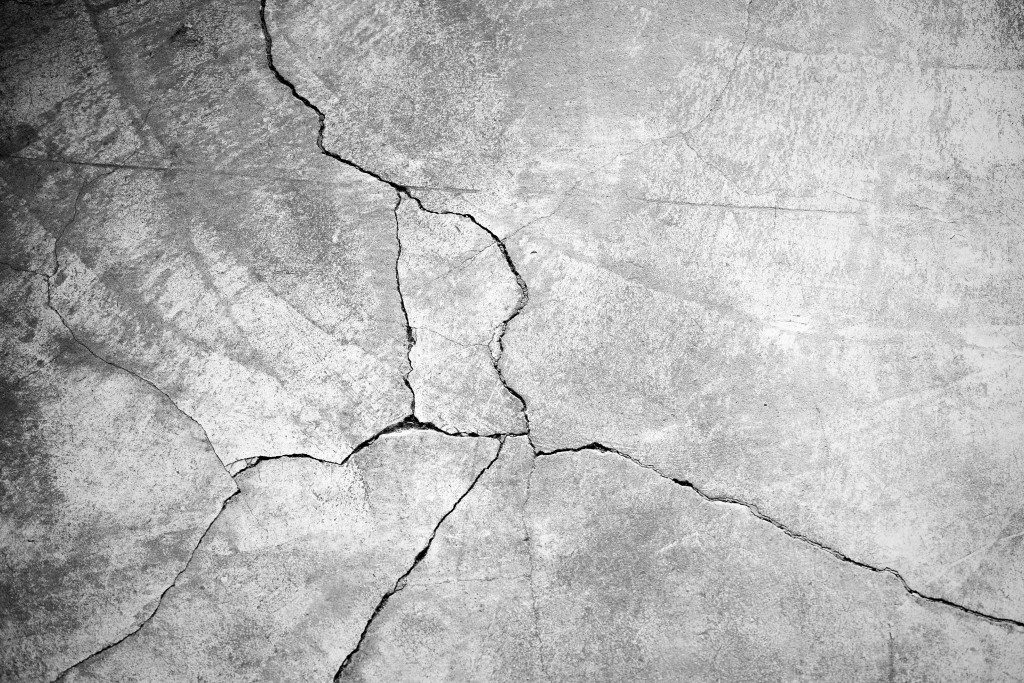 Grunge concrete cement wall with crack