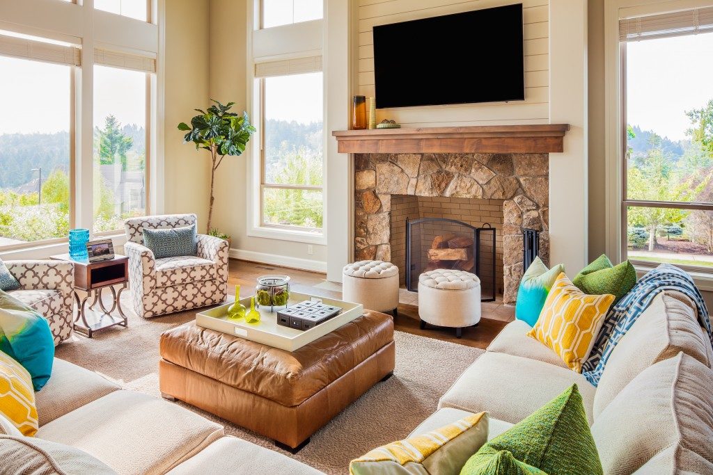 cottage themed living room with fireplace