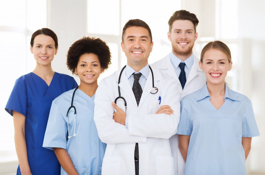 medical professionals in their respective uniforms