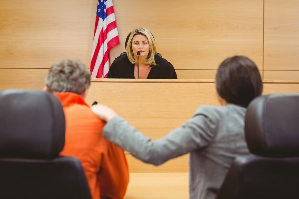 people at a court room hearing