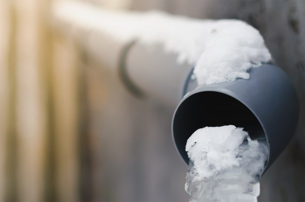 close shot of frozen pipe