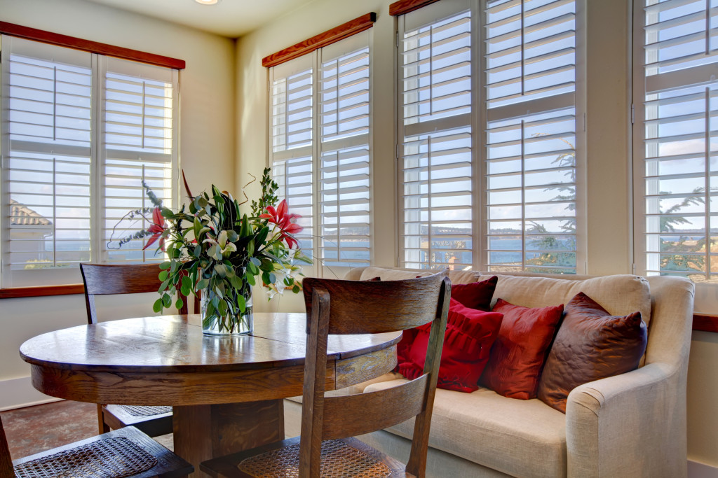 dining room with windows and blinds